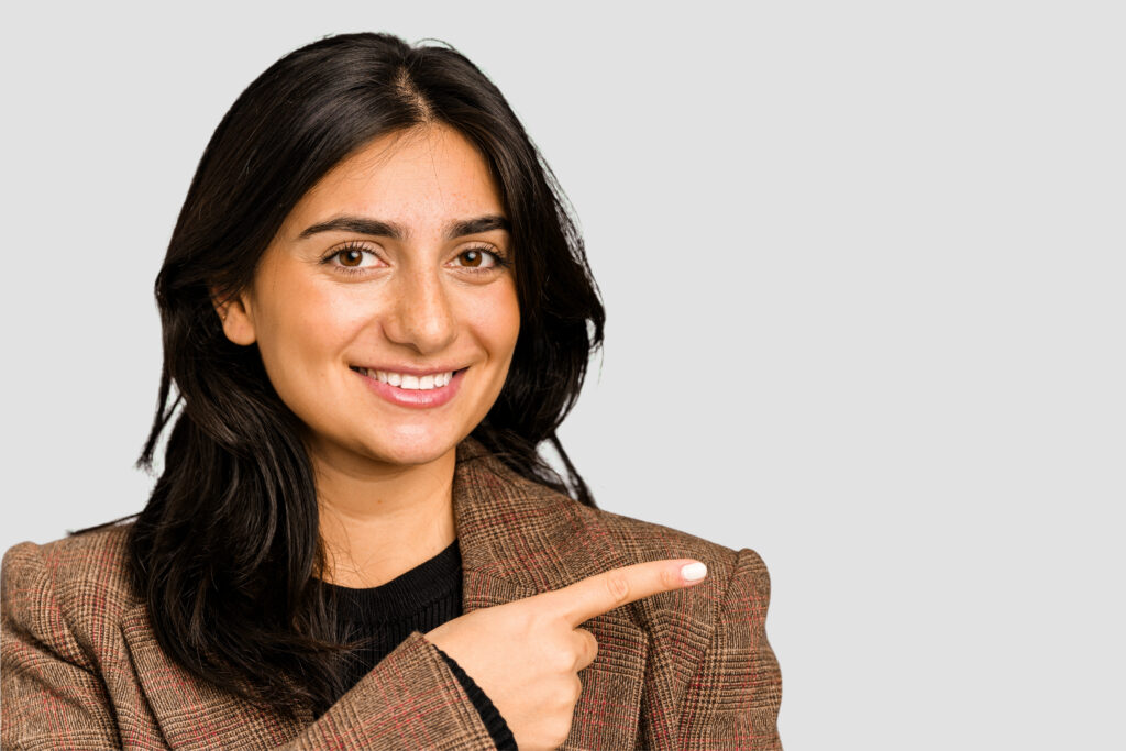 young indian business woman holding gesture isolated